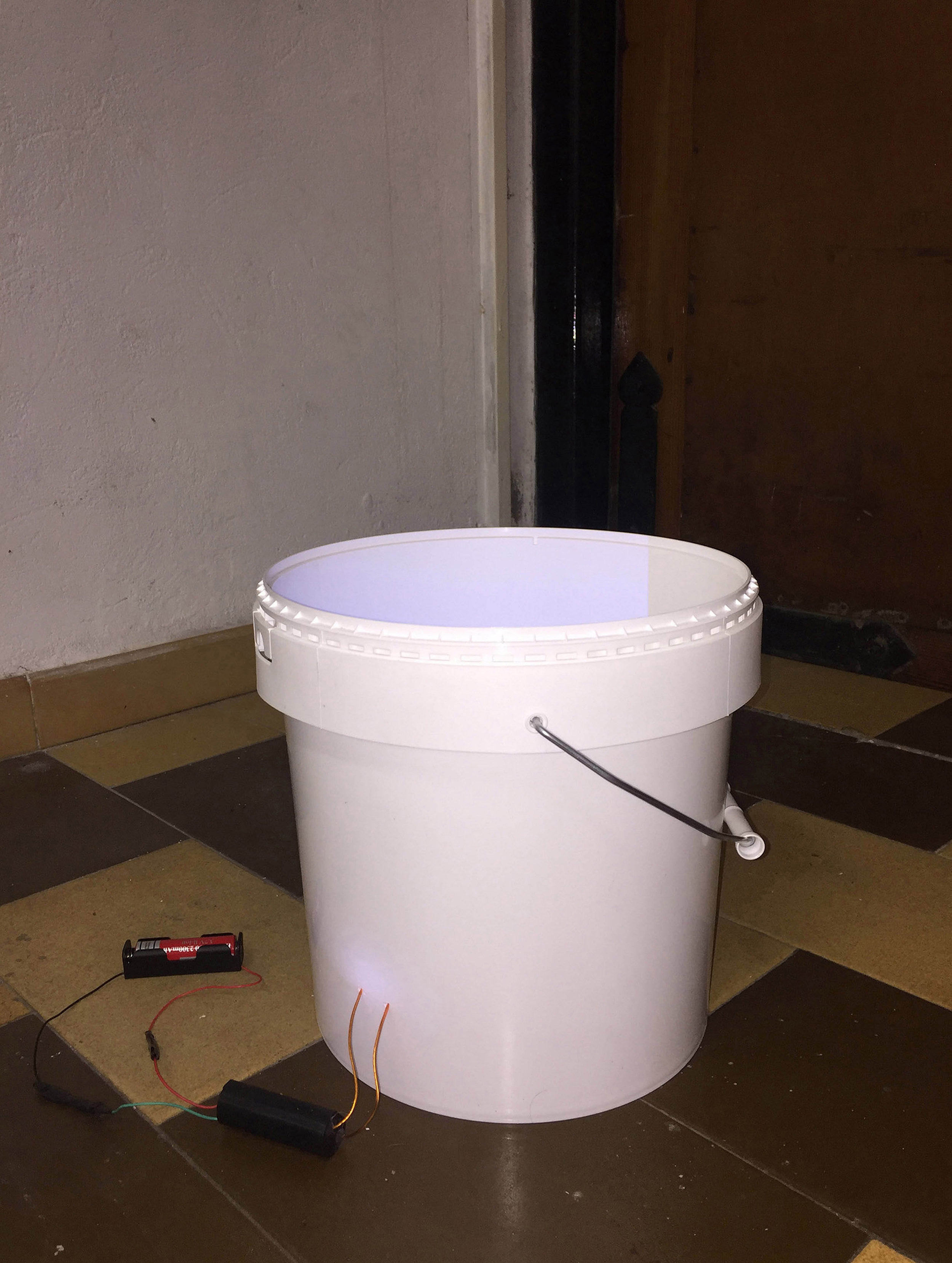 Oriented Combustions (Sketch Research No. 2. Feedback, 1/2), 2018 PVC bucket, natural charcoal scrawl on paper, laser photocopy, high voltage transformer (DC 3v